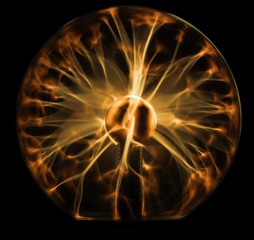 Golden plasma ball glowing in the dark