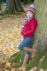 Autumn - little girl in autumn park portrait