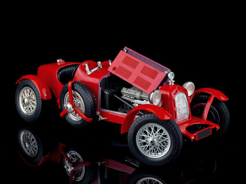 Vintage Red Car On Black Background