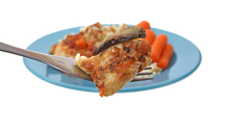 Small piece chicken cacciatore on fork