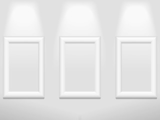 Three photo frames on the wall