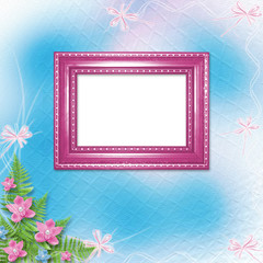 Wooden frame for photo with pink orchids and green fern