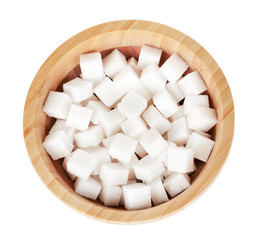 refined sugar in wooden bowl isolated on white