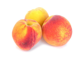 Fototapeta na wymiar Peaches on a white background.