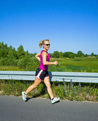 Running woman in summer