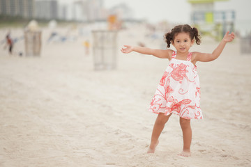 Toddler with arms outstretched