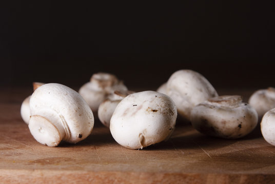 Mushrooms on a wooden chopping board