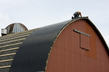 roofing a red barn