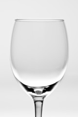 Empty wine glass isolated on white
