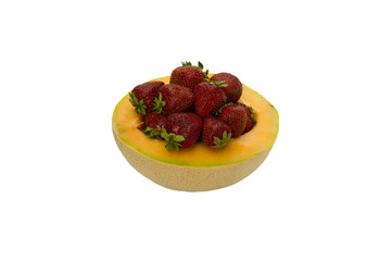 Fruit strawberry desert in half cantaloupe