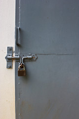 Closeup metal door with lock