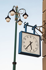 Fototapeta na wymiar Clock and lamp