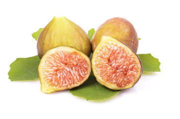 ripe figs, whole and sliced, green leaf