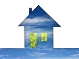Eco house metaphor. House with grass and sky.