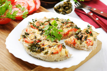 Pizza's meat with tomatoes and cheese