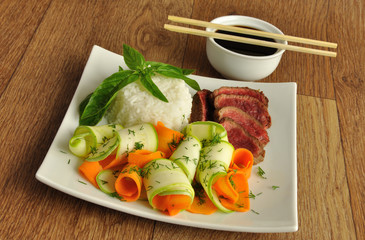 Veal meat with the blood with rice and vegetables
