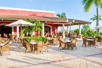 Dominican eating house and hotel with green trees