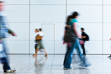 blurred trade fair visitors