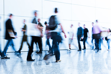 blurred trade fair visitors