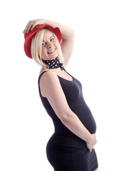 happy pregnant woman with red hat