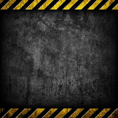 grunge concrete with warning stripe