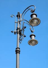 street lamp in Krakow against blue sky