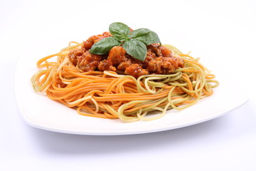 Colorful Spaghetti bolognese on a plate