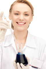 lab worker holding up test tube