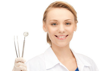 dentist with tools