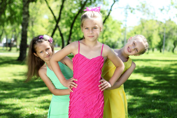 Fototapeta premium Children playing in the summer park