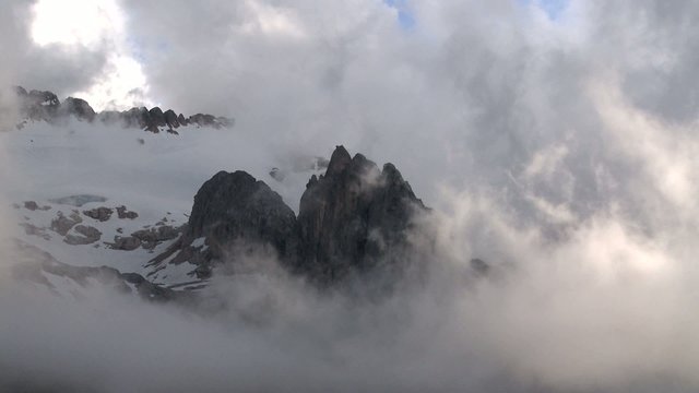 Mist over mountain glacier