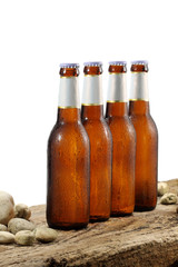 Cold Beer Bottles on wood