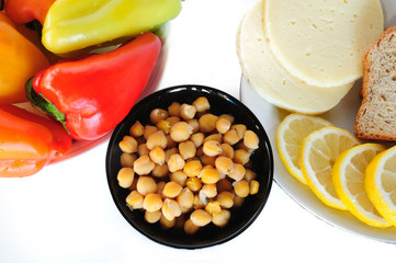 Chick peas in a bowl on a served table