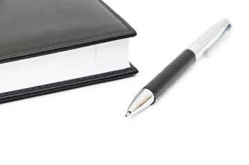 black leather Notebook and pen.