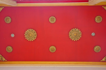 Golden on red thai, Buddha temple  ceiling decoration