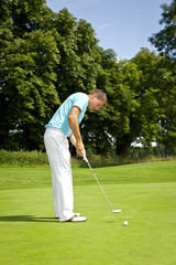 An image of a young male golf player