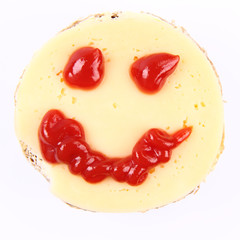 Smiling cheese sandwich for kids on white background