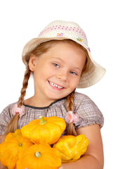 Llittle girl with bush pumpkins. Isolated over white