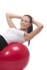 Obraz premium young girl accomplishing back muscles training and having fun, i