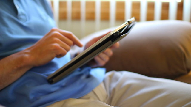 Man Using Tablet PC iPad