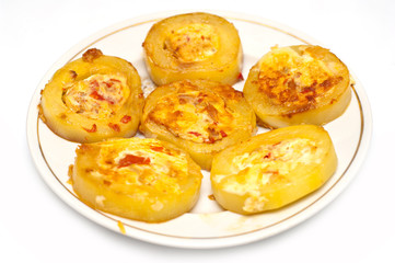 Baked aubergines with tomato, eggs and meat