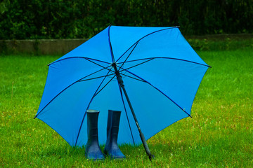 Regenschirm und Stiefel