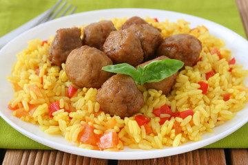 Yellow rice with meatballs