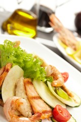 Shrimps with salmon and vegetables