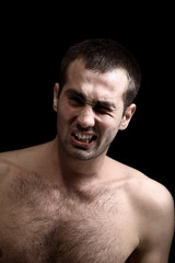 Obraz premium young man face expressions over black background