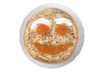 Pancake with red caviar