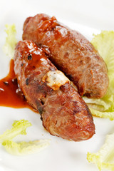 grilled sausages with sauce