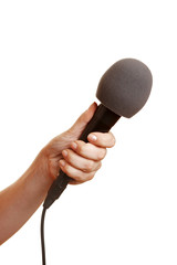 Hand hält Mikrofon