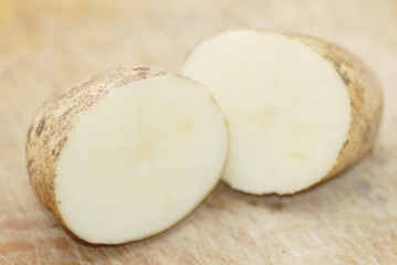 One Kestrel potato cut in half.