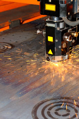 Industrial laser with sparks flying around